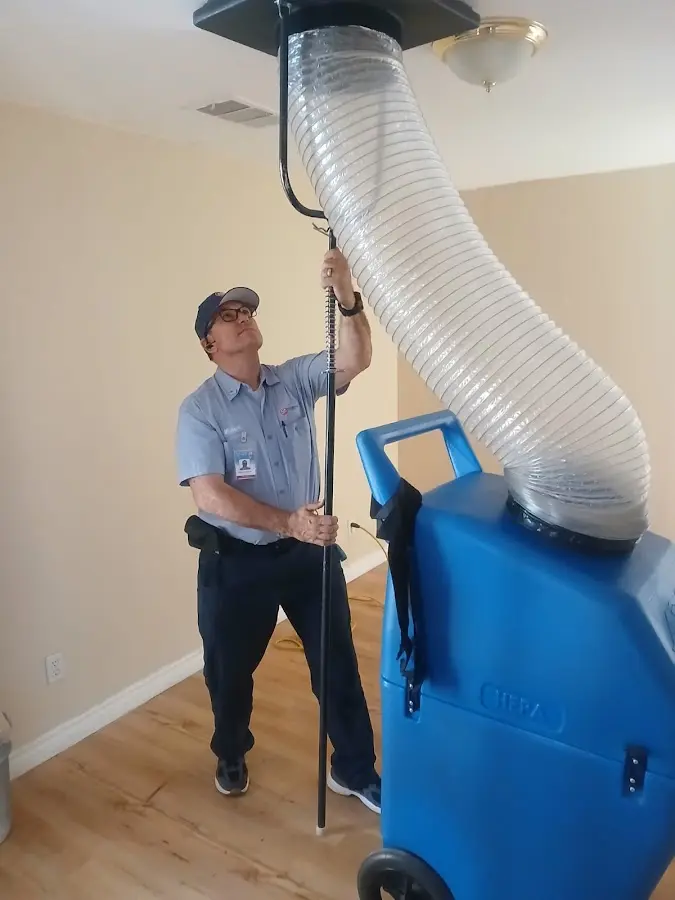 Mini Split Installation technician using HEPA equipment in Lakeville